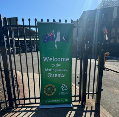 A gate with a sign on it
Description automatically generated