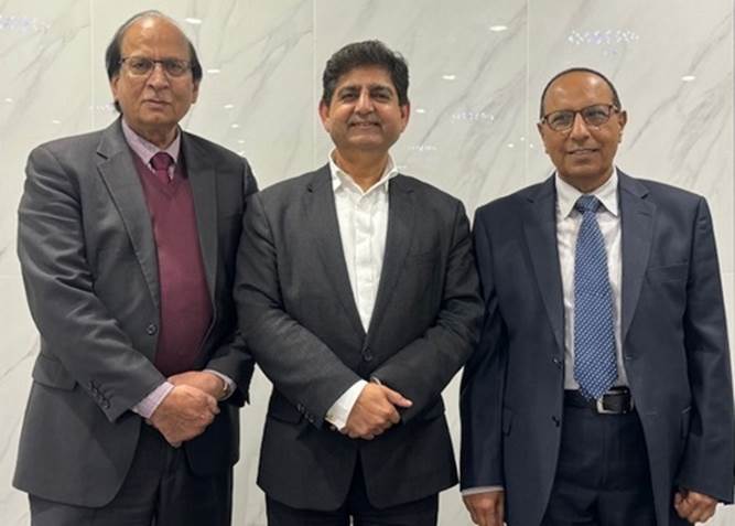 A group of men in suits
Description automatically generated